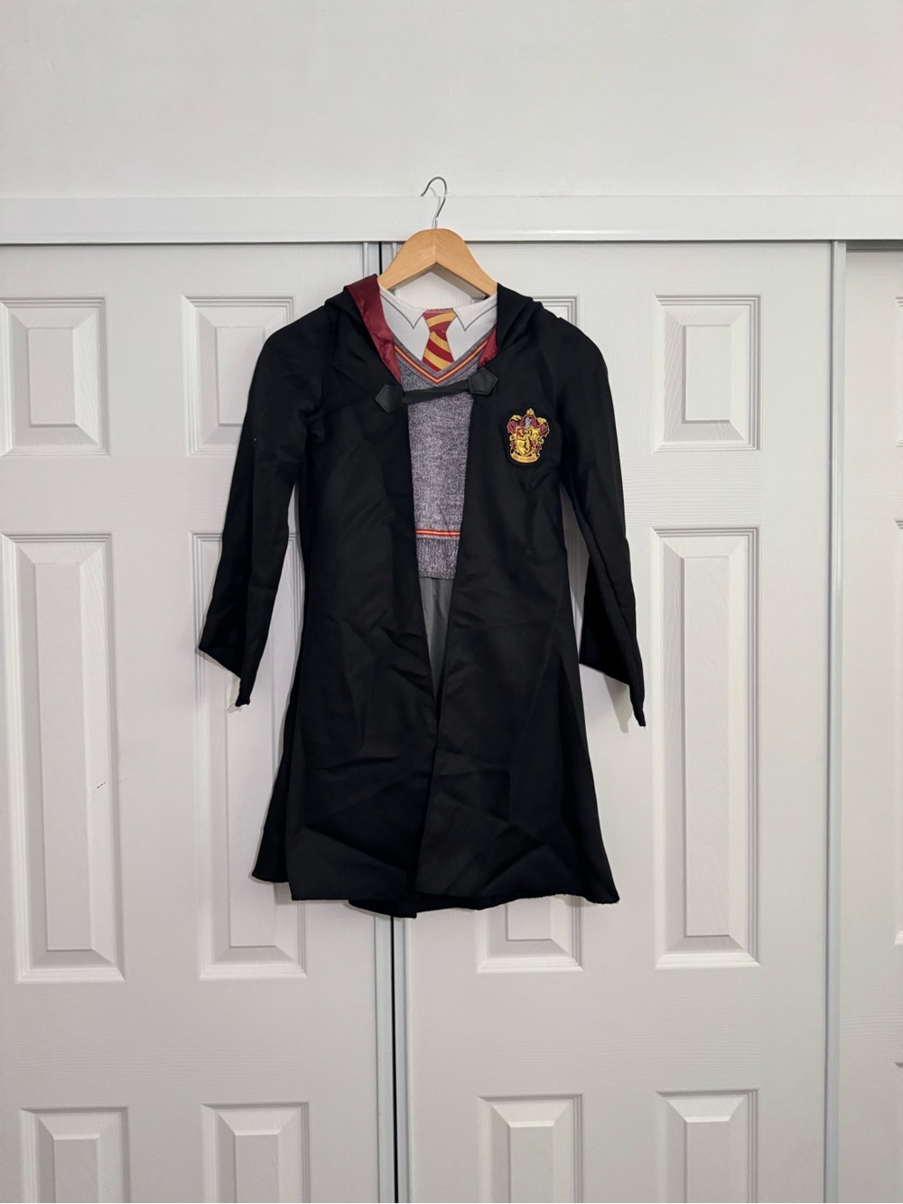Warner Bros. Kids Black Hooded Gryffindor Robe with Red Trim and Crest
